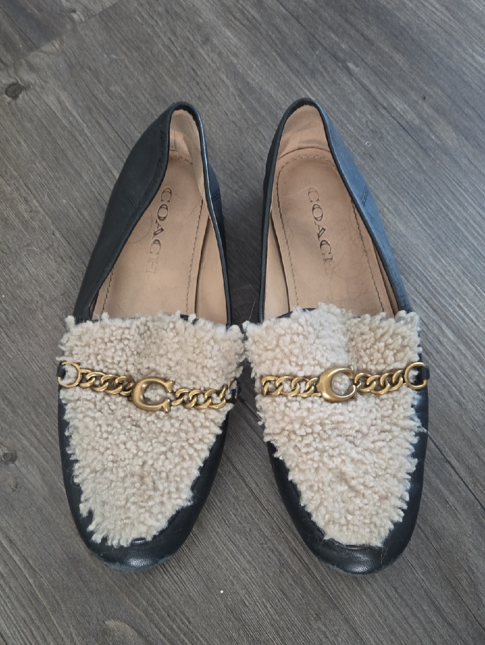 Coach Black Leather Loafers with Cream Shearling and Gold Chain